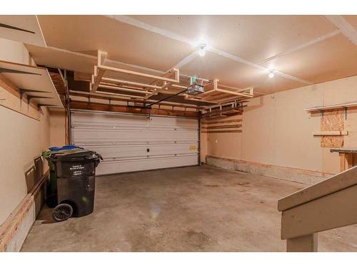 49 Rocky Ridge Green Nw, Calgary, AB - Indoor Photo Showing Garage