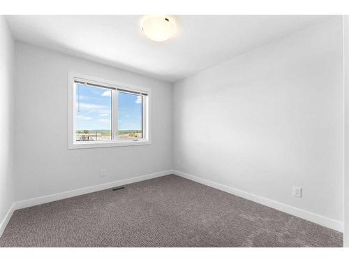 1078 Harmony Parade, Rural Rocky View County, AB - Indoor Photo Showing Living Room