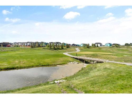 1078 Harmony Parade, Rural Rocky View County, AB - Outdoor With Facade