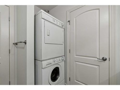 134-3111 34 Avenue Nw, Calgary, AB - Indoor Photo Showing Laundry Room