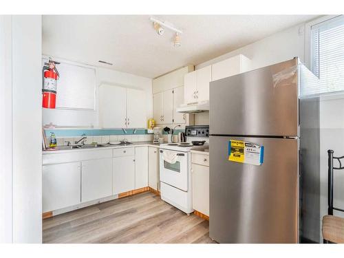 1727 12 Avenue Sw, Calgary, AB - Indoor Photo Showing Kitchen With Double Sink