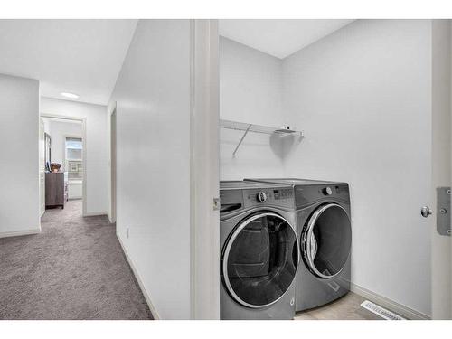 734 Redstone Drive Ne, Calgary, AB - Indoor Photo Showing Laundry Room