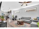 734 Redstone Drive Ne, Calgary, AB  - Indoor Photo Showing Living Room 