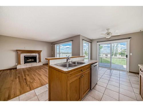 86 Hidden Hills Terrace Nw, Calgary, AB - Indoor With Fireplace