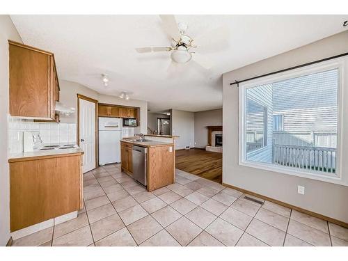 86 Hidden Hills Terrace Nw, Calgary, AB - Indoor Photo Showing Kitchen