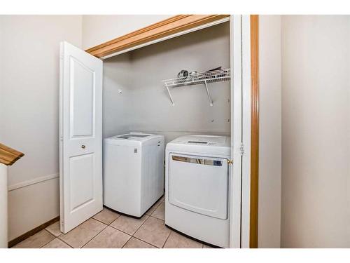 86 Hidden Hills Terrace Nw, Calgary, AB - Indoor Photo Showing Laundry Room