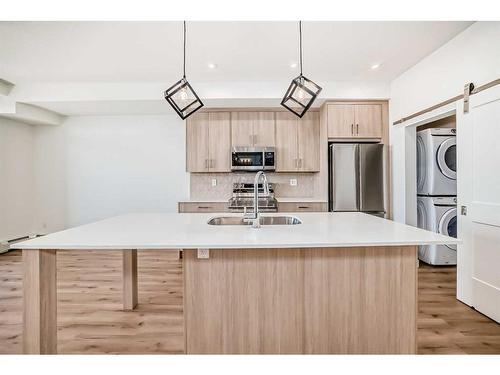 6404-200 Seton Circle Se, Calgary, AB - Indoor Photo Showing Kitchen With Double Sink With Upgraded Kitchen