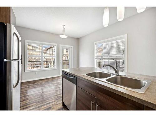 333-130 New Brighton Way Se, Calgary, AB - Indoor Photo Showing Kitchen With Double Sink