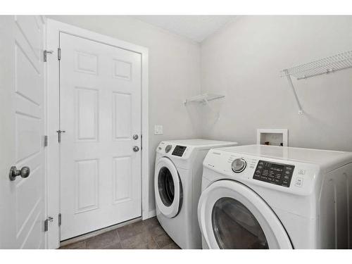 333-130 New Brighton Way Se, Calgary, AB - Indoor Photo Showing Laundry Room