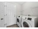 333-130 New Brighton Way Se, Calgary, AB  - Indoor Photo Showing Laundry Room 