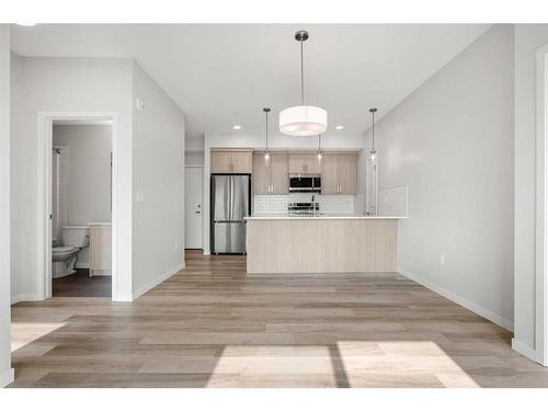 2413-33 Carringham Gate Nw, Calgary, AB - Indoor Photo Showing Kitchen With Stainless Steel Kitchen With Upgraded Kitchen