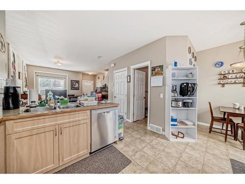 104 Ranch Ridge Meadow, Strathmore, AB - Indoor Photo Showing Kitchen With Double Sink