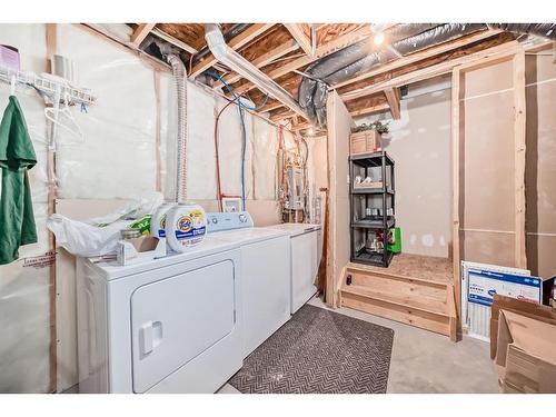 104 Ranch Ridge Meadow, Strathmore, AB - Indoor Photo Showing Laundry Room