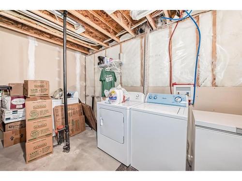 104 Ranch Ridge Meadow, Strathmore, AB - Indoor Photo Showing Laundry Room