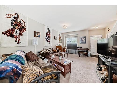 104 Ranch Ridge Meadow, Strathmore, AB - Indoor Photo Showing Living Room