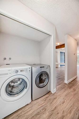 42 Dalhousie Crescent Nw, Calgary, AB - Indoor Photo Showing Laundry Room