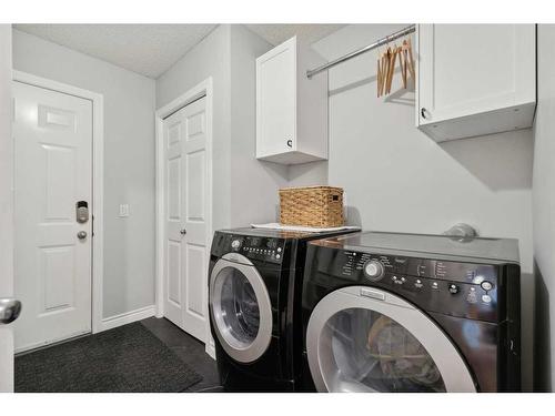 121 West Ranch Place Sw, Calgary, AB - Indoor Photo Showing Laundry Room