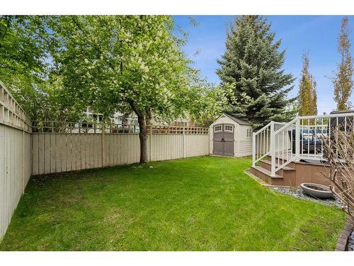 121 West Ranch Place Sw, Calgary, AB - Outdoor With Backyard