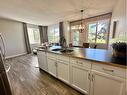 136 Everridge Gardens Sw, Calgary, AB  - Indoor Photo Showing Kitchen With Double Sink 
