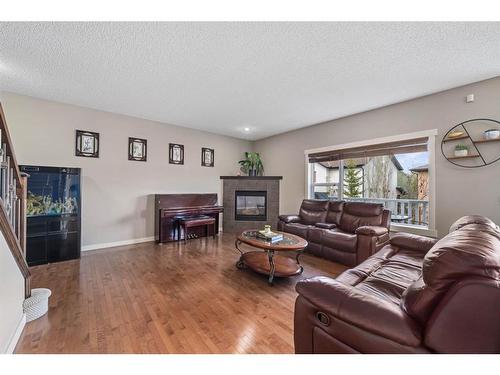 80 Tuscany Springs Terrace Nw, Calgary, AB - Indoor Photo Showing Living Room