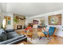 2919 14 Avenue Nw, Calgary, AB  - Indoor Photo Showing Living Room With Fireplace 