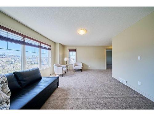 12 Crestmont Way Sw, Calgary, AB - Indoor Photo Showing Living Room