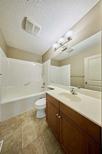 12 Crestmont Way Sw, Calgary, AB - Indoor Photo Showing Bathroom