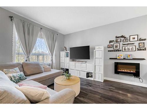 948 Nolan Hill Boulevard Nw, Calgary, AB - Indoor Photo Showing Living Room With Fireplace