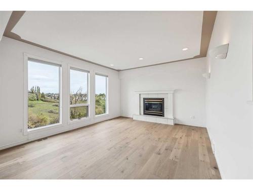 4020 Edgevalley Landing Nw, Calgary, AB - Indoor Photo Showing Living Room With Fireplace