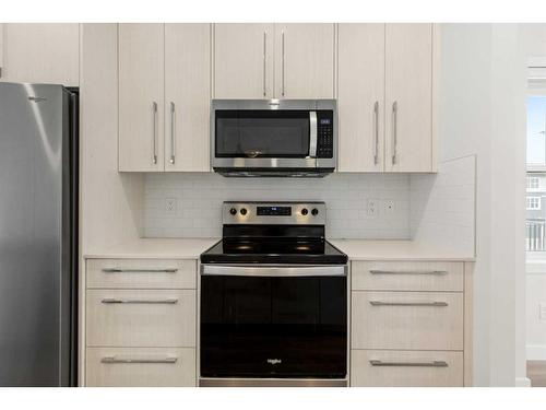 521-72 Cornerstone Manor Ne, Calgary, AB - Indoor Photo Showing Kitchen With Upgraded Kitchen
