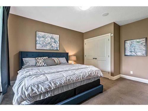 18 Ranchers Place, Okotoks, AB - Indoor Photo Showing Bedroom
