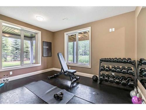 18 Ranchers Place, Okotoks, AB - Indoor Photo Showing Gym Room