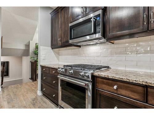 27 Silverado Skies Lane Sw, Calgary, AB - Indoor Photo Showing Kitchen With Upgraded Kitchen