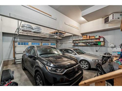 27 Silverado Skies Lane Sw, Calgary, AB - Indoor Photo Showing Garage
