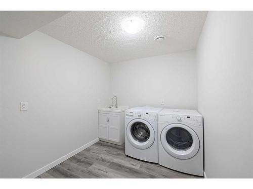 44 Covemeadow Road Ne, Calgary, AB - Indoor Photo Showing Laundry Room