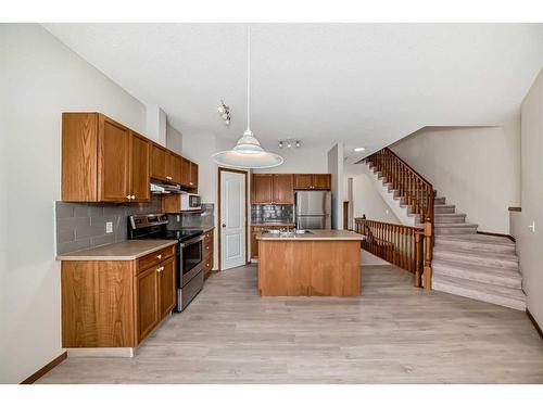 113 Hamptons Link Nw, Calgary, AB - Indoor Photo Showing Kitchen With Double Sink