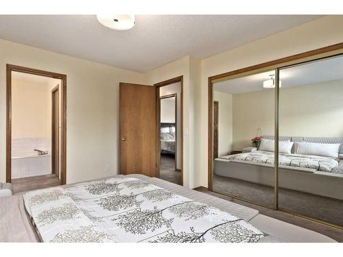 501 Hawkstone Drive Nw, Calgary, AB - Indoor Photo Showing Bedroom