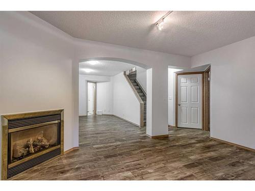10782 Valley Springs Road Nw, Calgary, AB - Indoor With Fireplace
