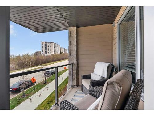 101-30 Shawnee Common Sw, Calgary, AB - Outdoor With Exterior