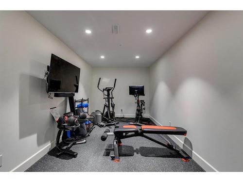 2439 Uxbridge Drive Nw, Calgary, AB - Indoor Photo Showing Gym Room
