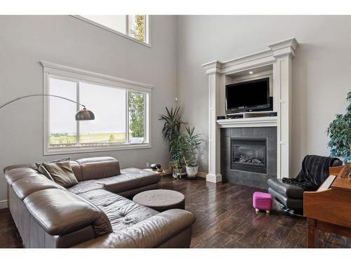 431 Rocky Ridge Drive Nw, Calgary, AB - Indoor Photo Showing Living Room With Fireplace