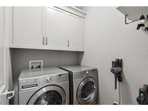 431 Rocky Ridge Drive Nw, Calgary, AB - Indoor Photo Showing Laundry Room