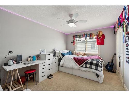 431 Rocky Ridge Drive Nw, Calgary, AB - Indoor Photo Showing Bedroom