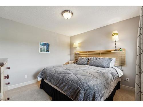 431 Rocky Ridge Drive Nw, Calgary, AB - Indoor Photo Showing Bedroom