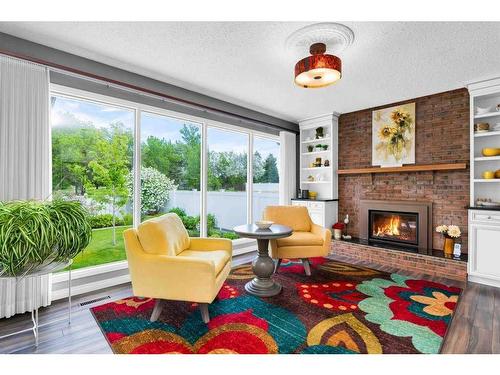 25 Violet Court Se, Medicine Hat, AB - Indoor Photo Showing Living Room With Fireplace