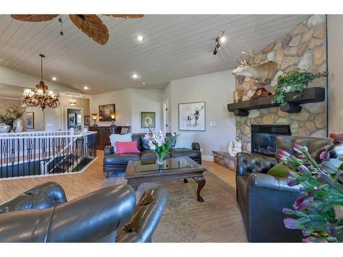 251138 Range Road 61, Rural Bighorn No. 8, M.D. Of, AB - Indoor Photo Showing Living Room With Fireplace