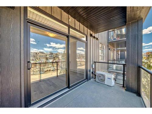 2210-55 Lucas Way Nw, Calgary, AB - Outdoor With Balcony With Exterior