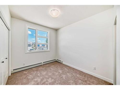 2210-55 Lucas Way Nw, Calgary, AB - Indoor Photo Showing Other Room