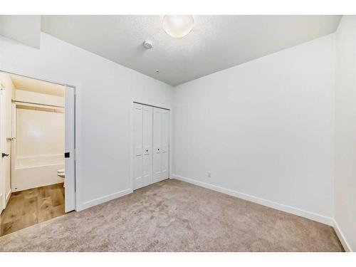 2210-55 Lucas Way Nw, Calgary, AB - Indoor Photo Showing Other Room