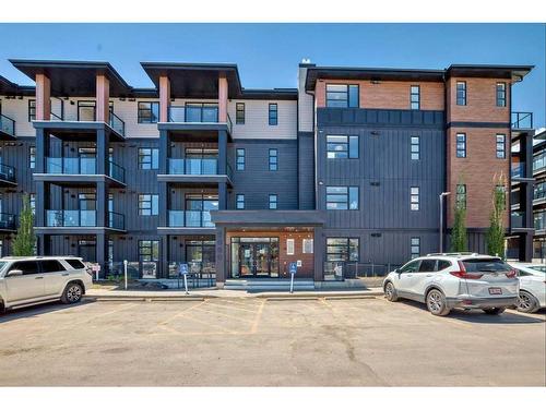 2210-55 Lucas Way Nw, Calgary, AB - Outdoor With Balcony With Facade